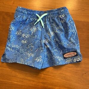 Boys vineyard vines happy swimming trunks.